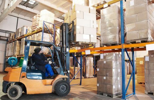 Palco forklift rental shown in shipping and storage warehouse application.